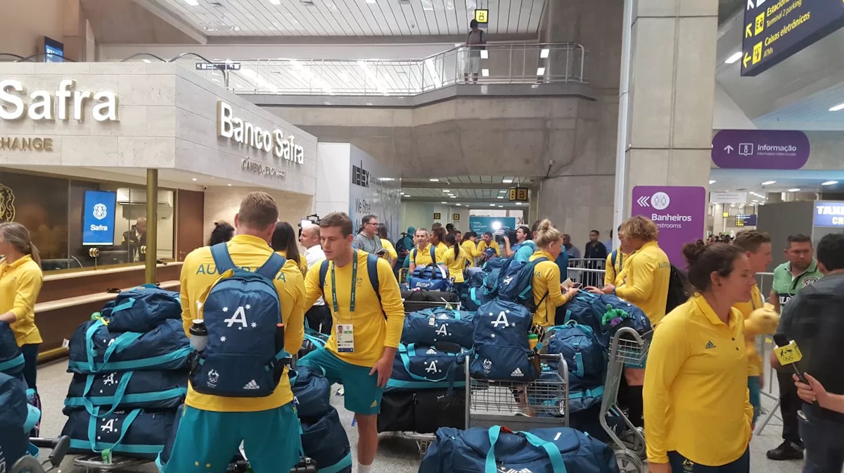 Green and gold brigade arrive at Rio airport