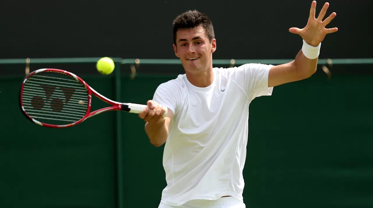 Tomic tough to the finish