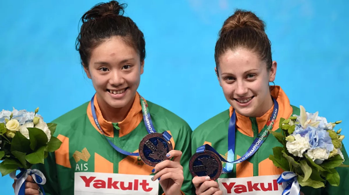 Divers win two bronze and qualify team for Rio