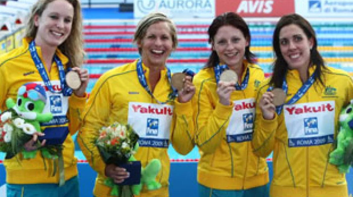 Australia win medal but lose records on opening day