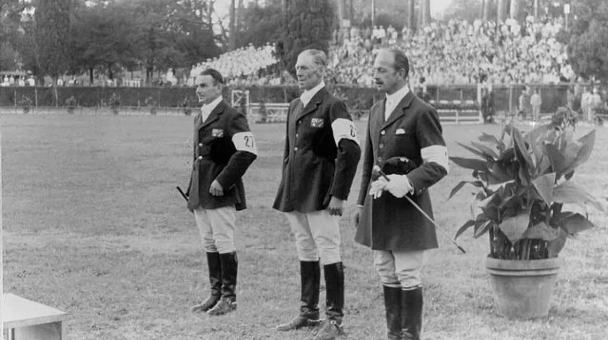 The medal ceremony for the equestrian individual three-day event. (From left) Neale Lavis (AUS) wins the silver medal, Laurie Morgan (AUS) wins the gold medal and Anton Buehler (SUI) wins the bronze medal.