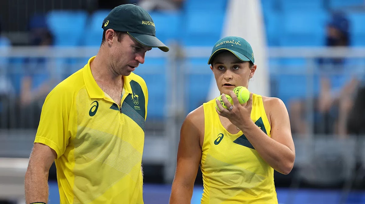 Ashleigh Barty of Team Australia and John Peers of Team Australia play Horacio Zeballos of Team Argentina and Nadia Podorska of Team Argentina in their Mixed Doubles First Round match against on day five of the Tokyo 2020 Olympic Games at Ariake Tennis Pa