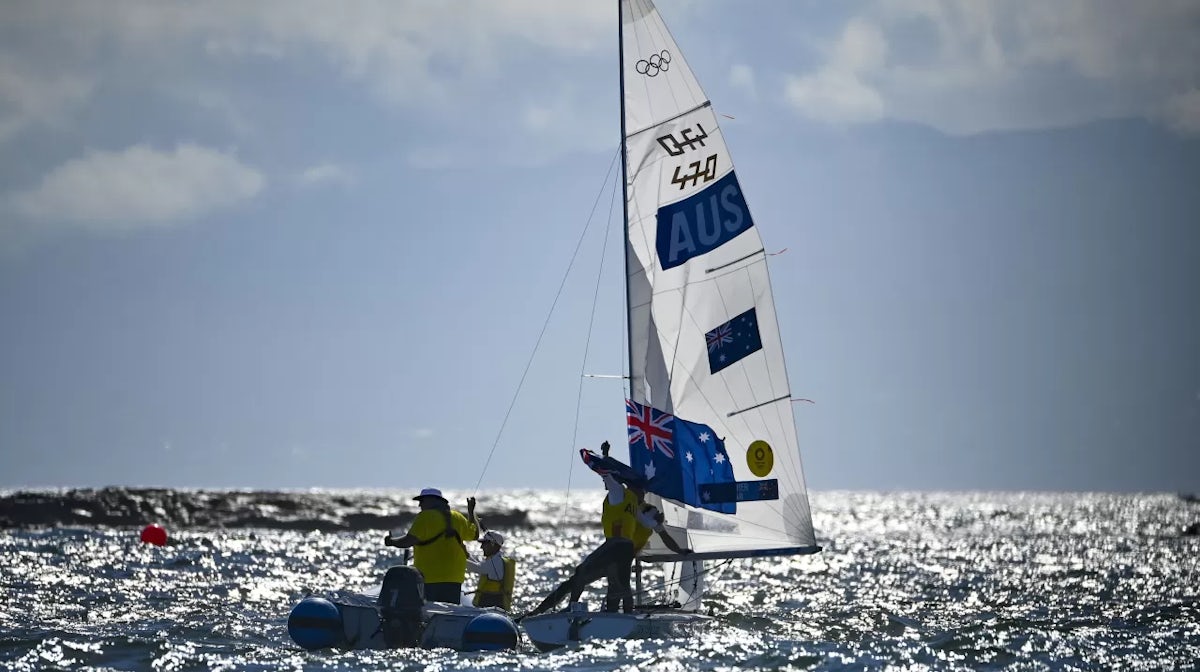 Australia's Will Ryan and Australia's Mathew Belcher celebrate after the men's two-person dinghy 470 medal race during the Tokyo 2020 Olympic Games