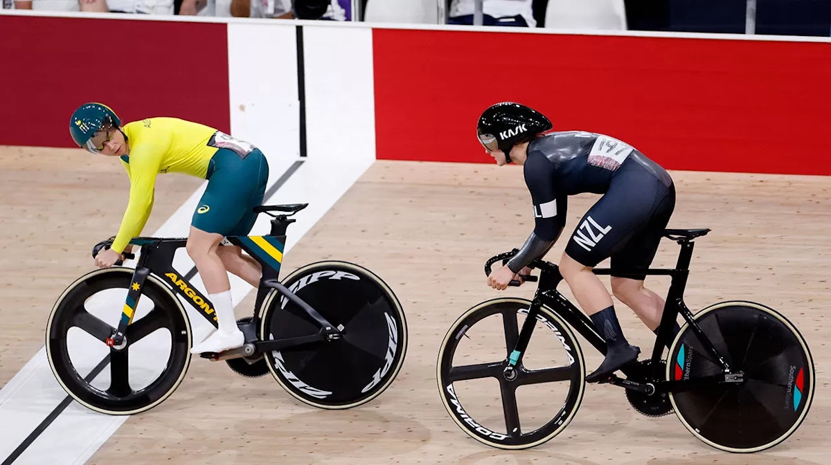 New Zealand's Ellesse Andrews (R) and Australia's Kaarle Mcculloch compete in a heat of the women's track cycling sprint 1/32 finals during the Tokyo 2020 Olympic Games at Izu Velodrome in Izu