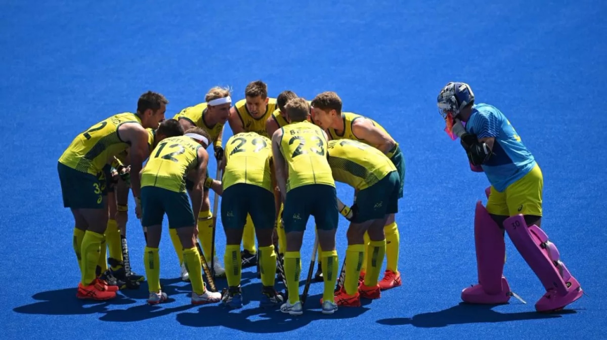 Players of Australia celebrate after teammate Tim Brand (29) scored a goal against Japan during their men's pool A match of the Tokyo 2020 Olympic Games field hockey competition, at the Oi Hockey Stadium in Tokyo on July 24, 2021. 