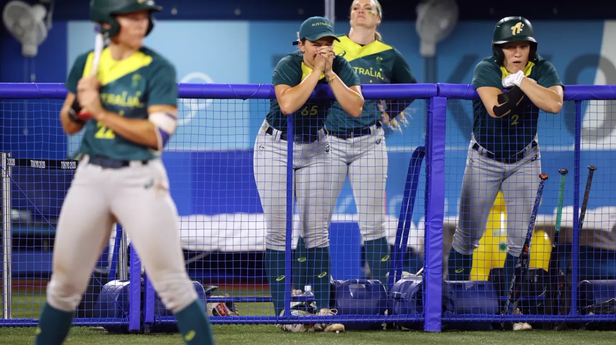 Taylah Tsitsikronis #65 and Clare Warwick #2 of Team Australia look on from the dugout in the fourth inning against Team Mexico during softball opening round on day three of the Tokyo 2020 Olympic Games at Yokohama Baseball Stadium on July 26, 2021 in Yok