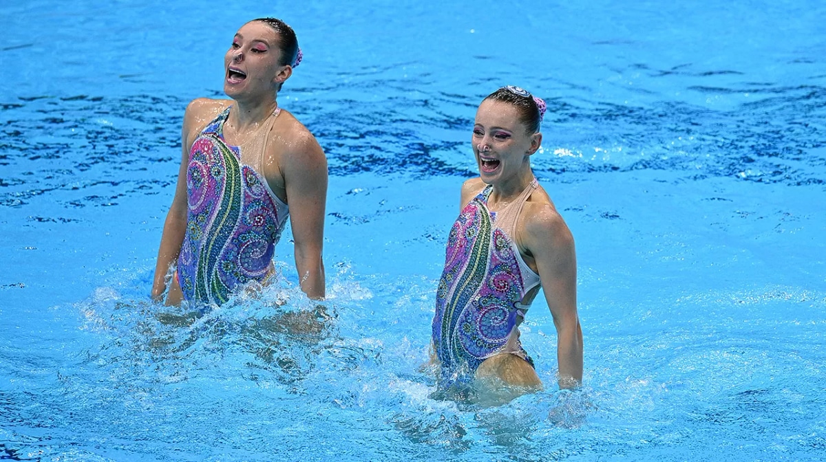 Emily Rogers and Australia's Amie Thompson competes in the preliminary for the women's duet free artistic swimming event during the Tokyo 2020 Olympic Games at the Tokyo Aquatics Centre