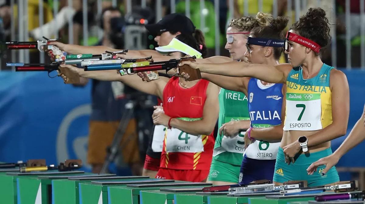 Chloe Esposito of Australia (R) competes during the Combined Running/Shooting during the Modern Pentathlon on Day 14 of the Rio 2016 Olympic Games at the Deodoro Stadium on August