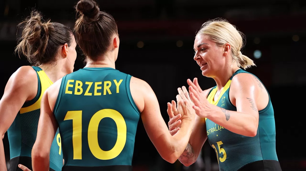 Cayla George #15 of Team Australia high-fives teammate Katie Ebzery #10 during the first half of their Women's Basketball Preliminary Round Group C game against China on day seven of the Tokyo 2020 Olympic Games at Saitama Super Arena 